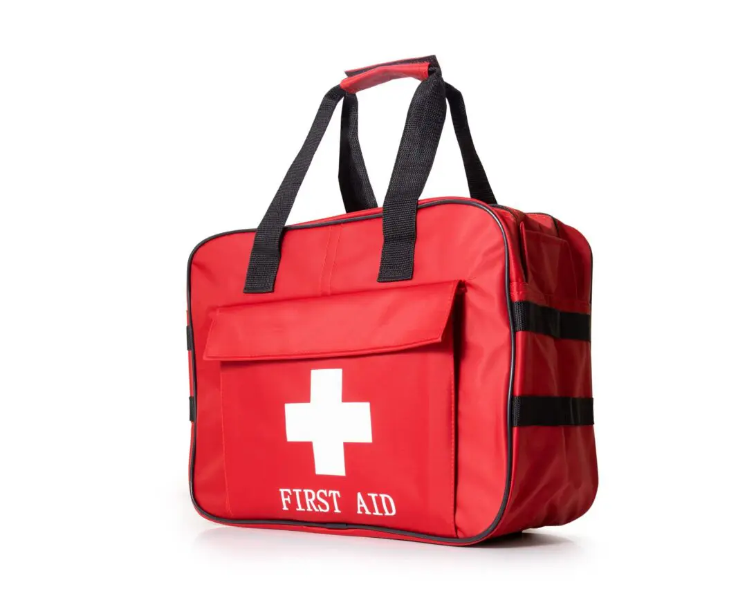 Red first aid kit with white cross.