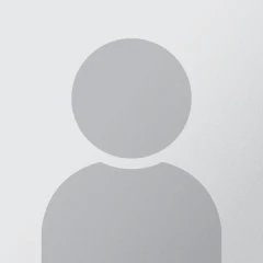 Default profile avatar silhouette on gray background.